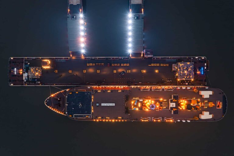 aerial-photo-of-the-cruise-ship-by-the-dock-at-night